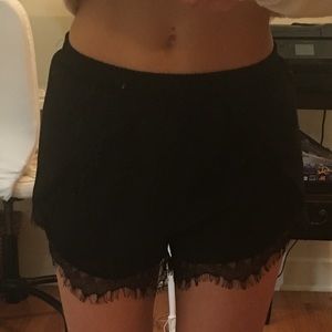 Black shorts with lace trim